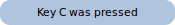 Blue rounded widget showing Key C was pressed