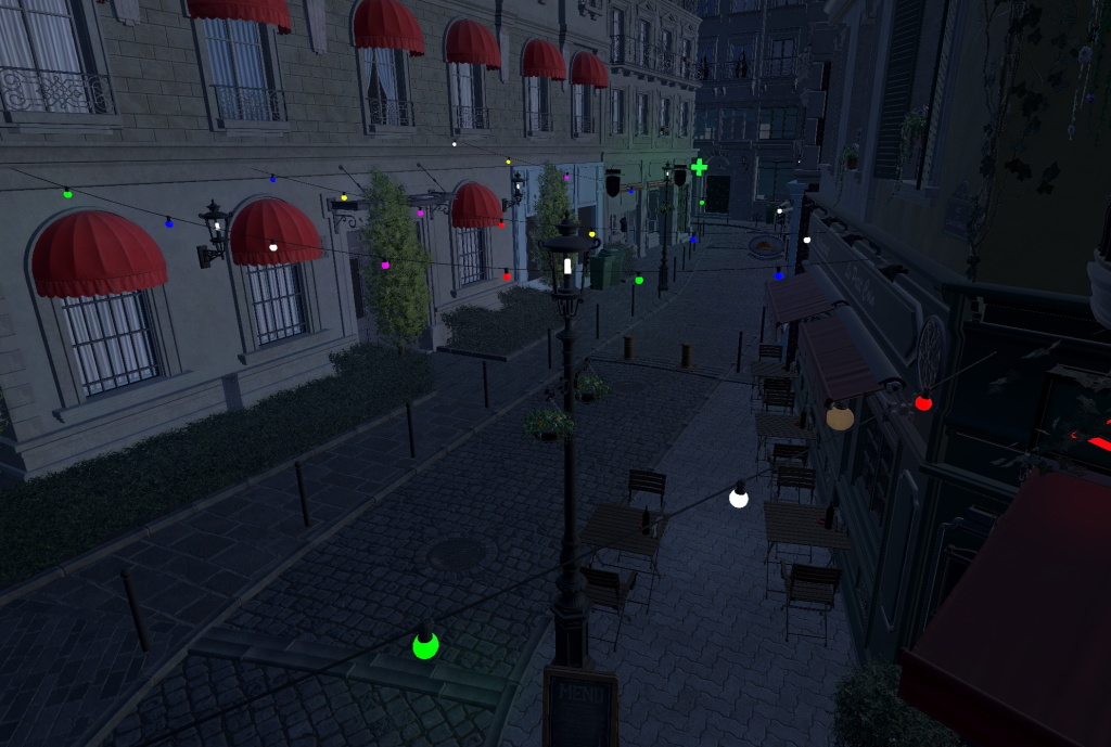 City with buildings, red awnings, and outdoor cafe seating