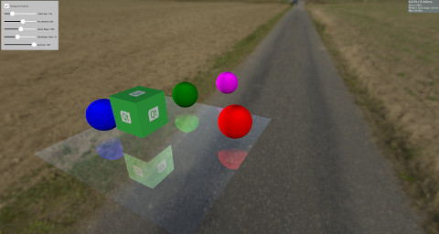 Superficie reflectante con esferas de colores y objetos flotantes