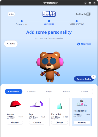 Vista en 3D de un oso de juguete personalizable con accesorios en la etapa de personalización del juguete Vista en 3D de un oso de juguete personalizable con accesorios en la etapa de personalización del juguete