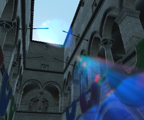 Cour en pierre avec des fantômes de lens flare très proches les uns des autres