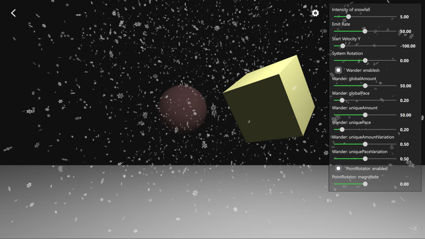 Deux cubes colorés avec des particules de neige qui tombent et un panneau de réglage des particules Deux cubes colorés avec des particules de neige qui tombent et un panneau de réglage des particules